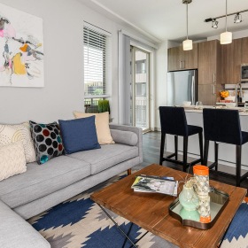 a living room with a couch and a table