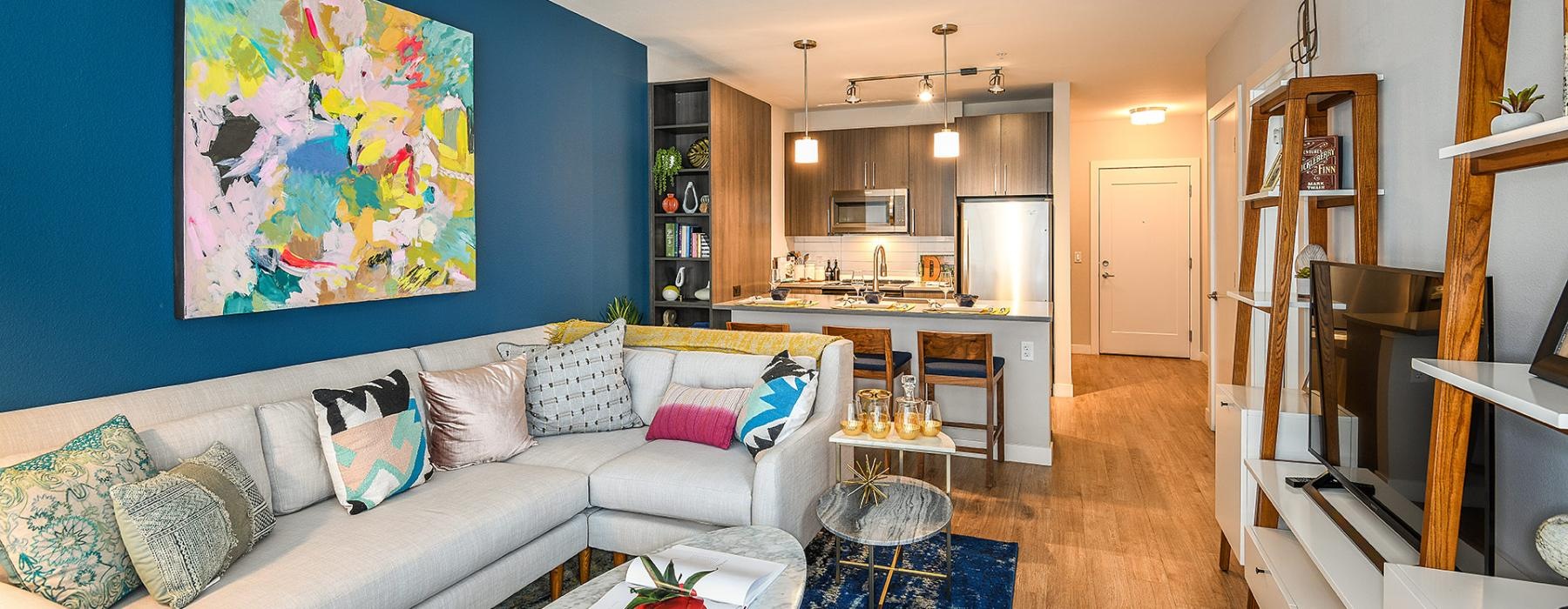 a living room with a couch and a table