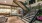 a room with a wood floor and a staircase