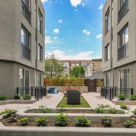 a courtyard between two buildings