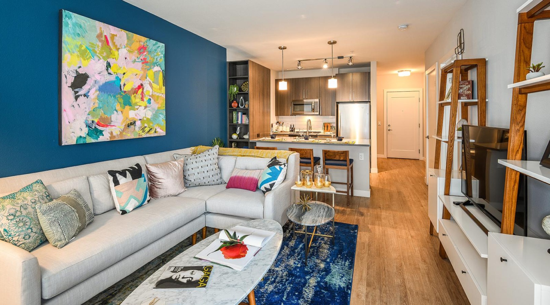 a living room with a couch and a table