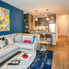 a living room with a couch and a table