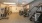 a room with treadmills and a tv on the wall